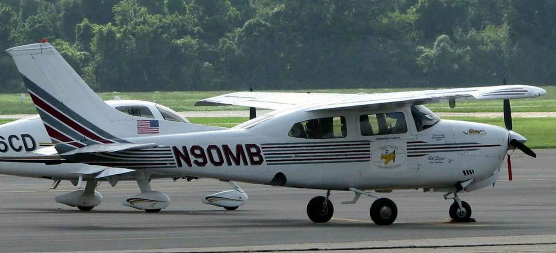 Cessna N90MB parked from distance